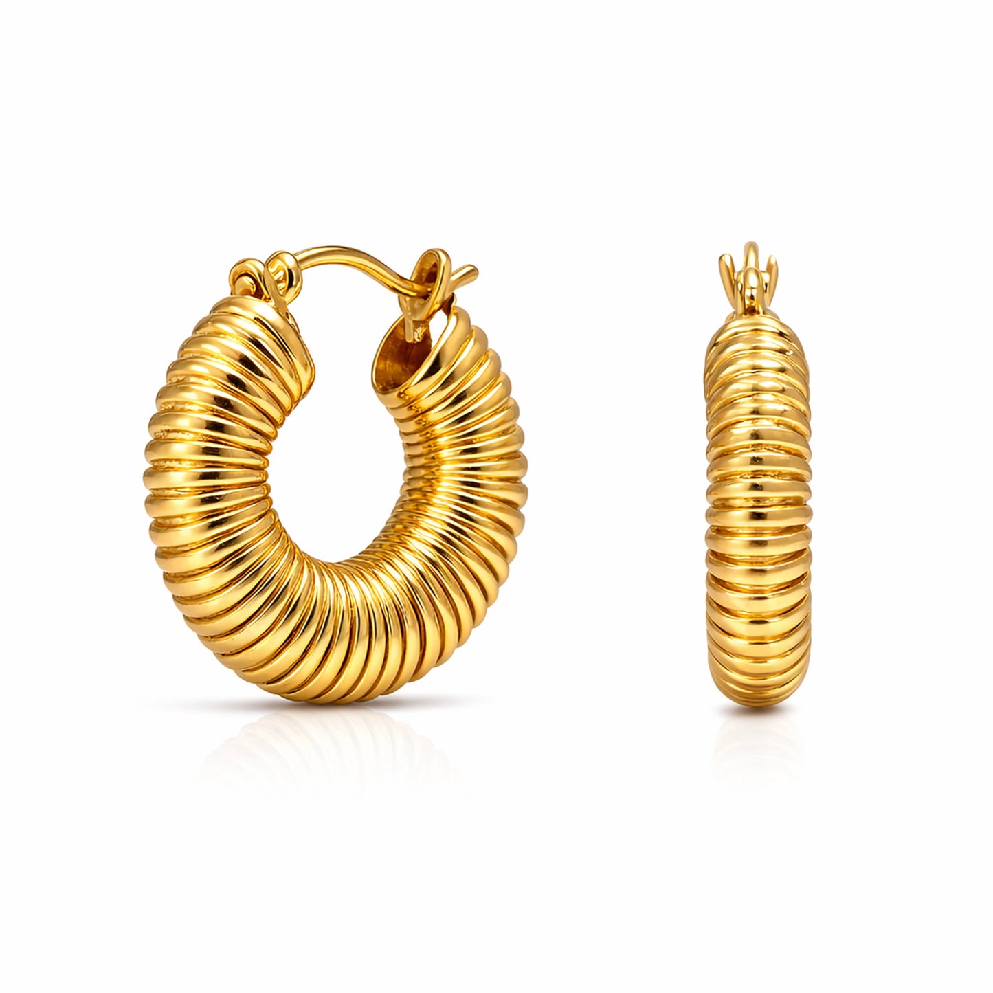 Gold hoop earrings on a white background