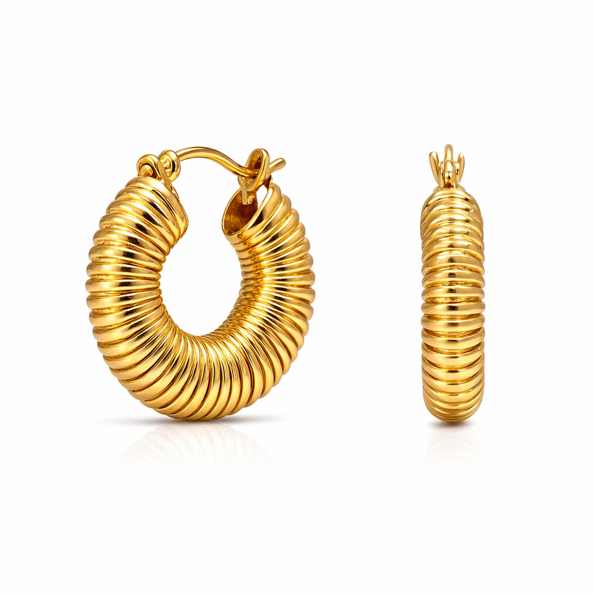 Gold hoop earrings on a white background
