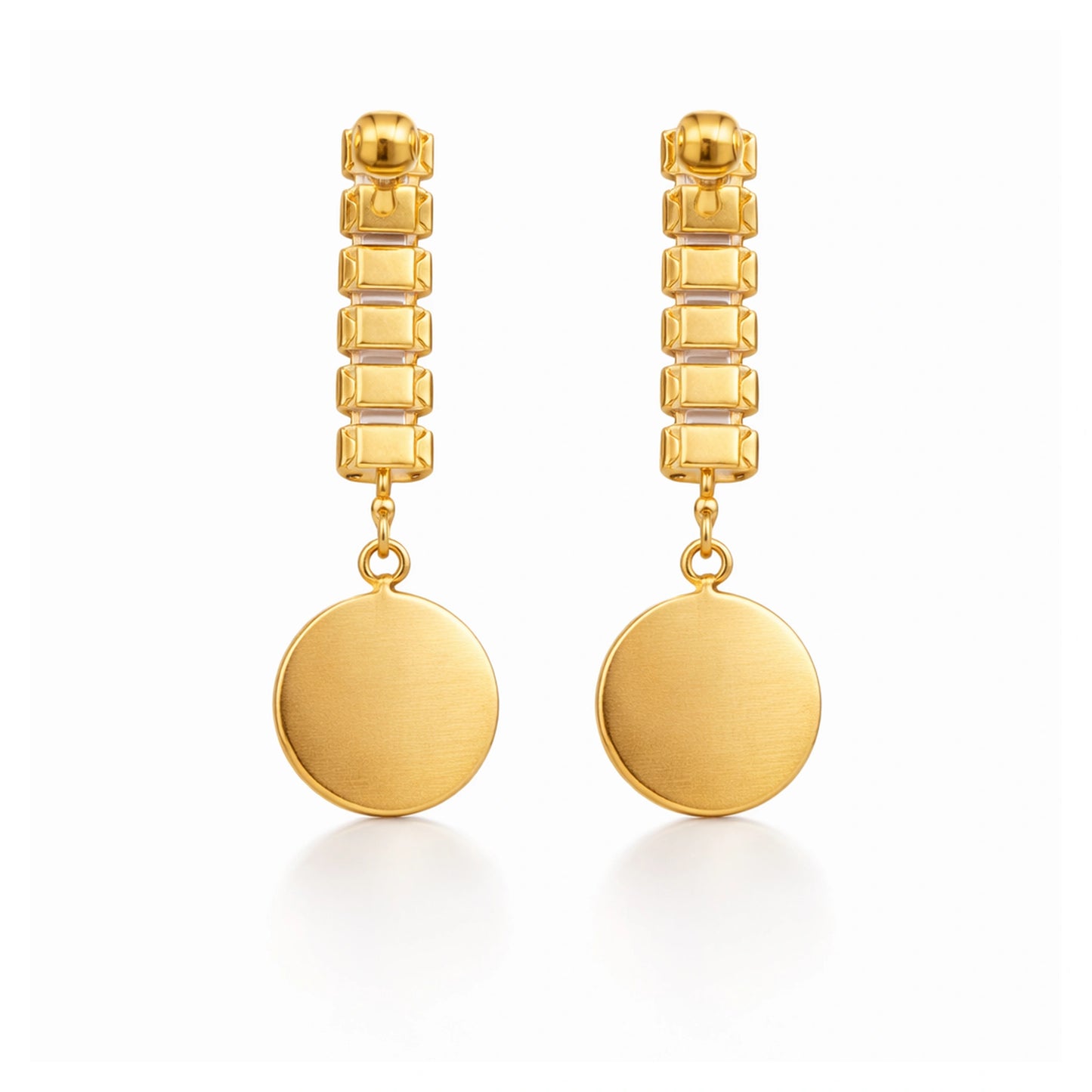 Pair of gold earrings with geometric design on a white background