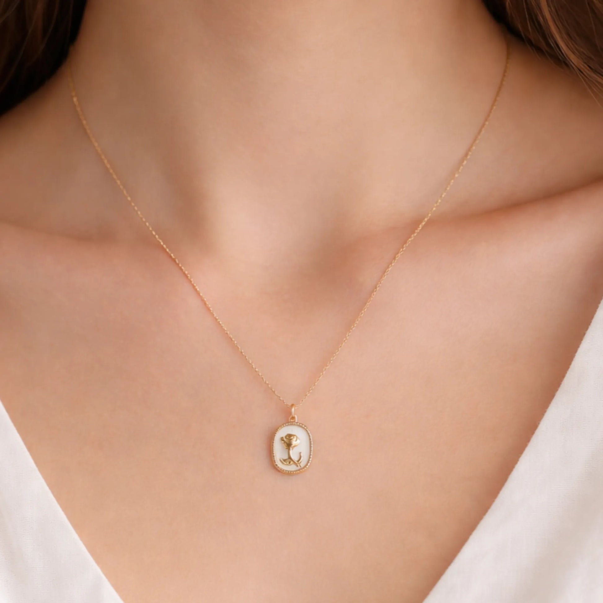 YUBIRAA gold rose pendant necklace worn on neck, anti tarnish stainless steel jewellery for everyday elegance