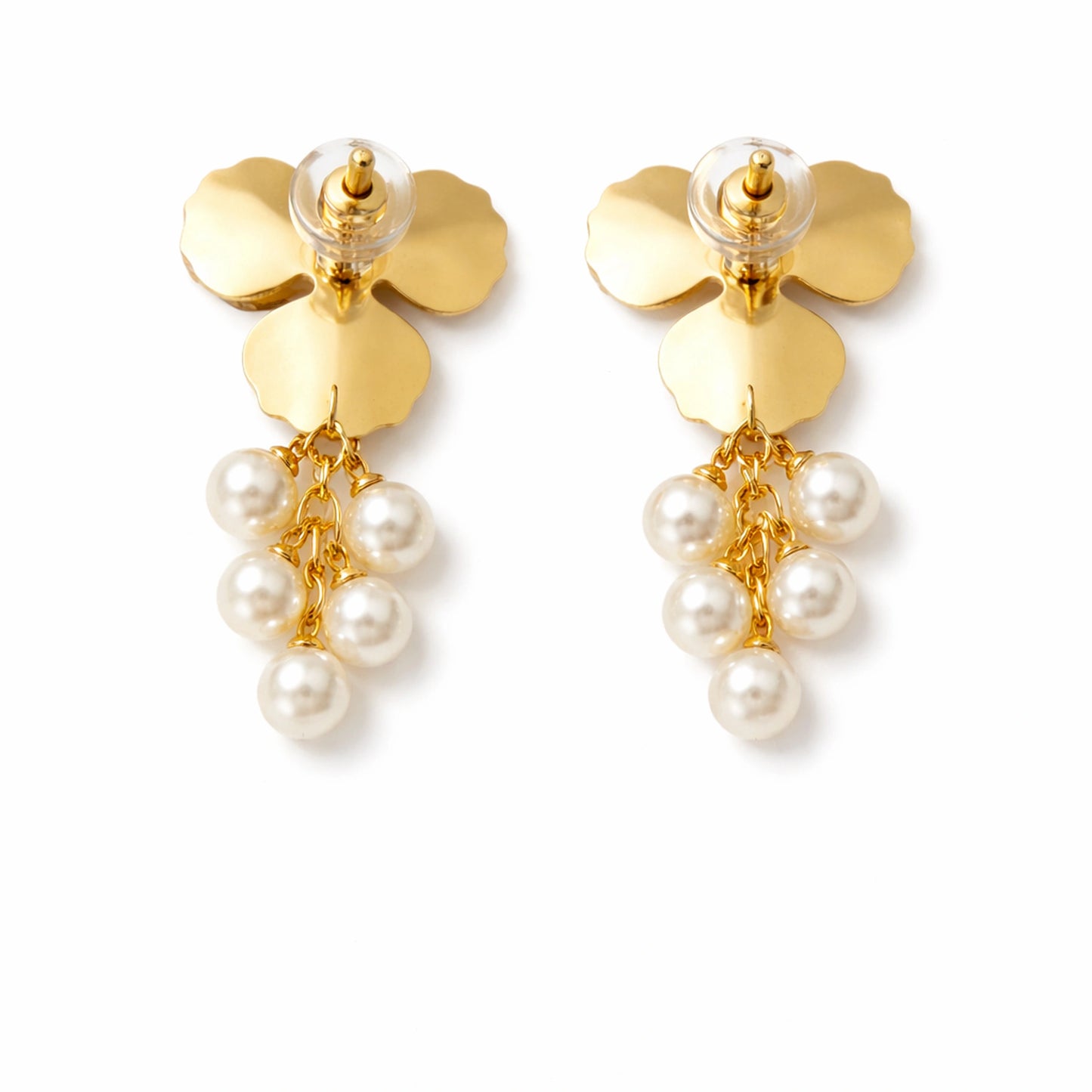 Gold flower earrings back with pearl drops on a white background