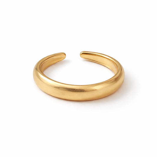 Gold ring on a white background