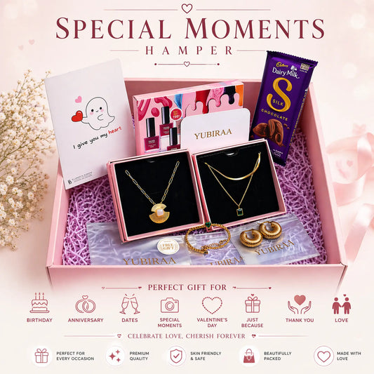 Gift hamper with jewelry, chocolate, and nail paint items in a pink box.