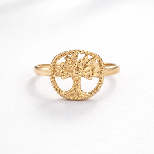 Gold tree of life adjustable ring with circular textured design on white background