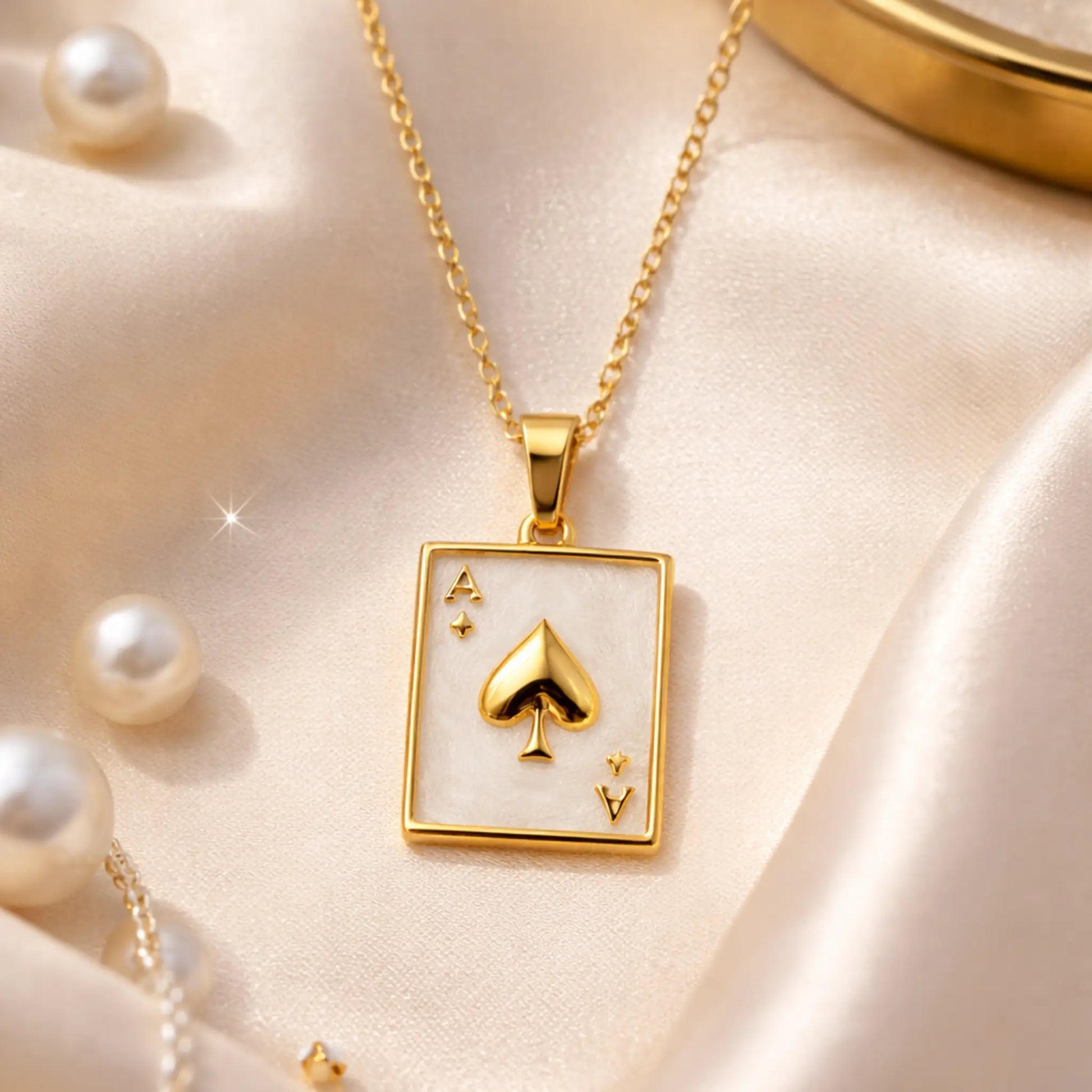 Yubiraa The Ace Edit anti tarnish gold plated necklace styled on satin fabric with pearl aesthetic luxury look