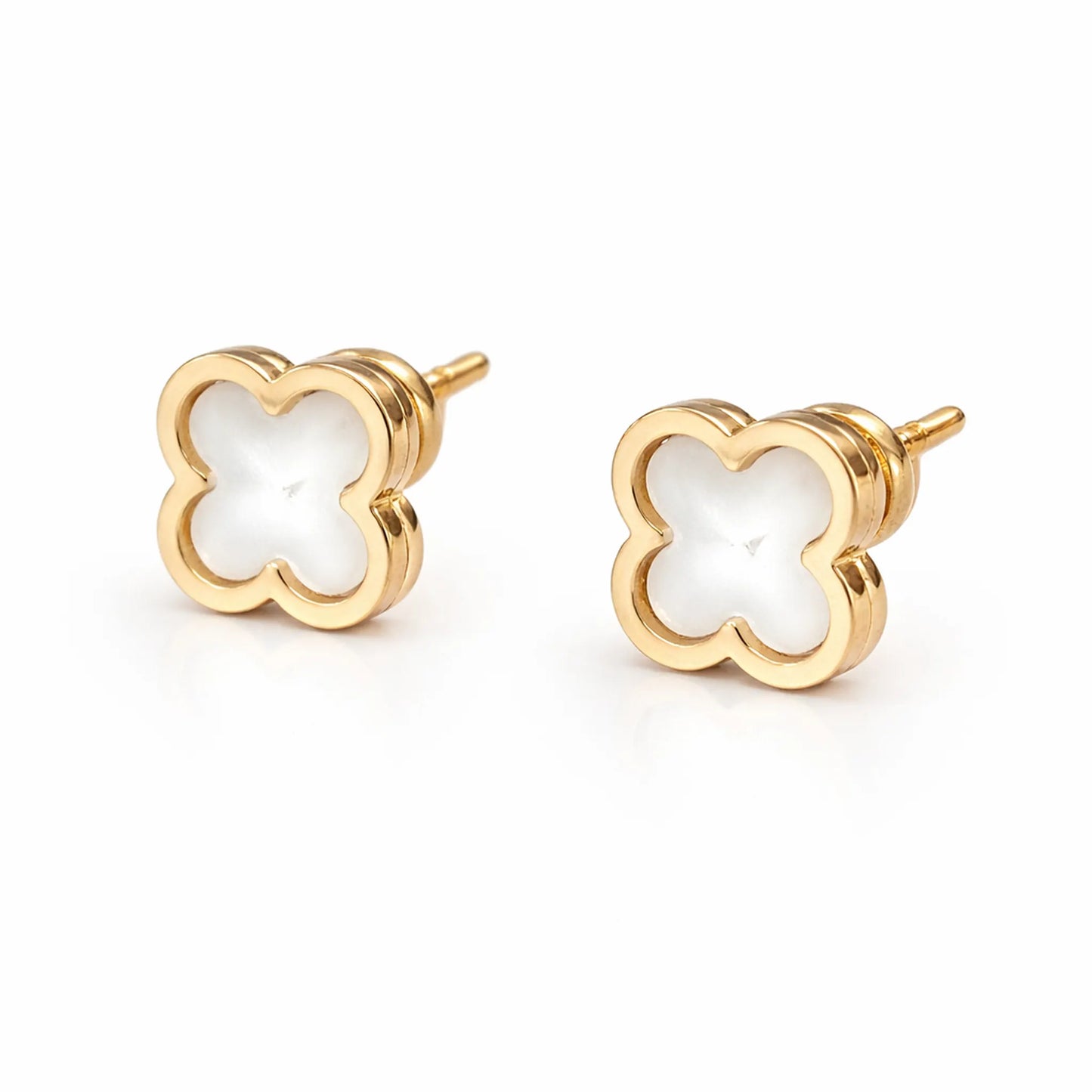 Close up of Yubiraa white clover stud earrings showing smooth enamel finish and polished gold plated border