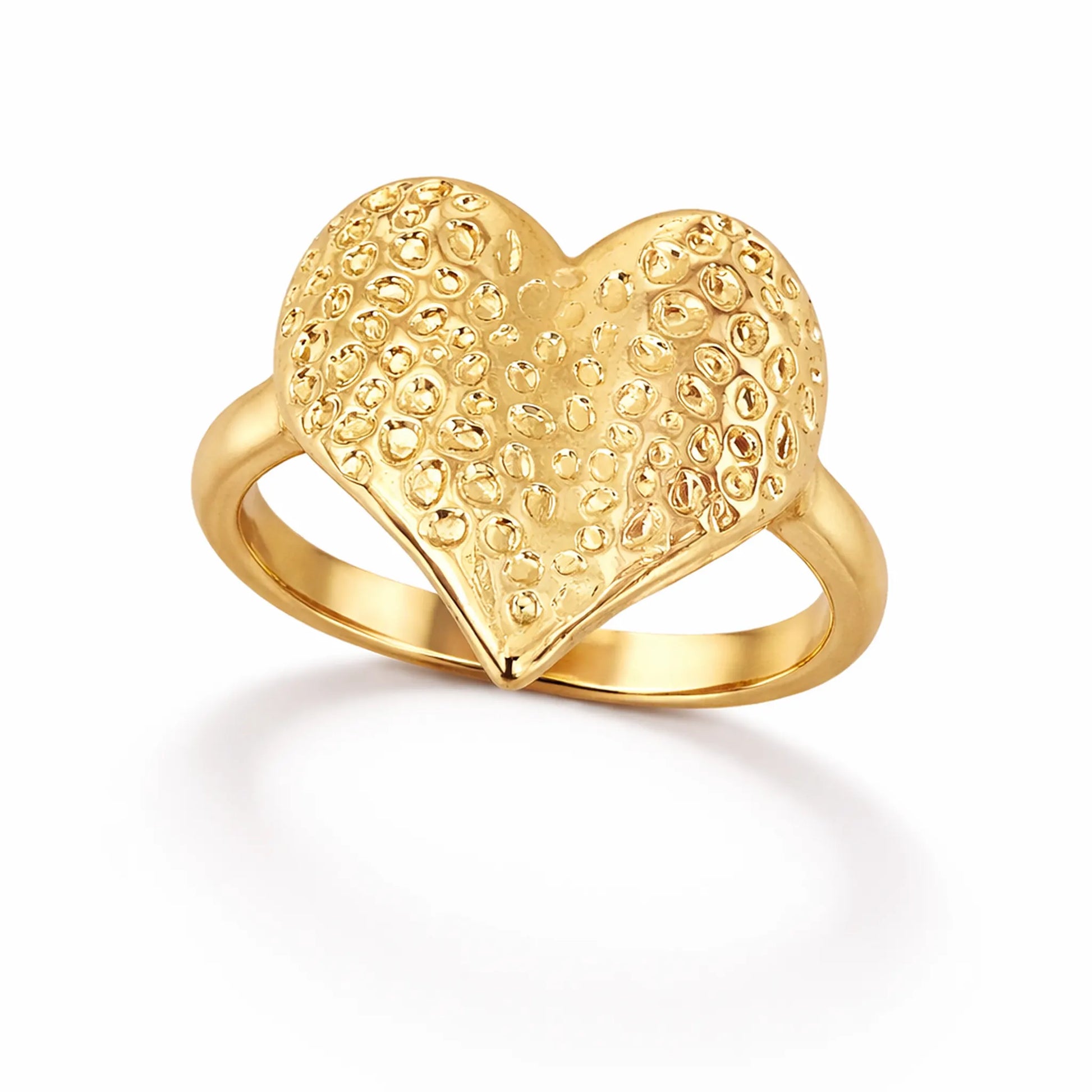 Gold textured heart adjustable ring on white background